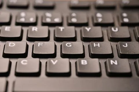 Black Computer Keyboard Macro Shot Highlighting G Key with Angled Top View .. Stock Photos
