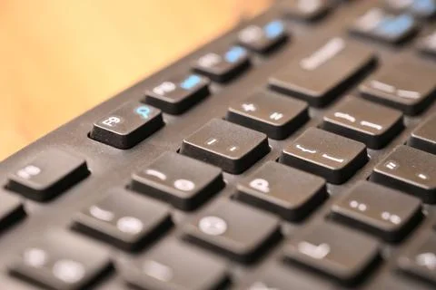 Black Computer Keyboard Macro Shot Highlighting Hyphen and Underscore Key w.. Stock Photos