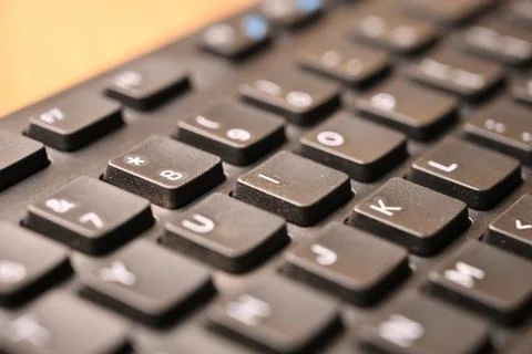 Black Computer Keyboard Macro Shot Highlighting I Key with Soft Blurred Bac.. Stock Photos