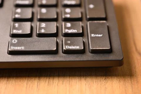 Black Computer Keyboard Macro Shot Highlighting Delete Key on Numeric Keypa.. Foto stock