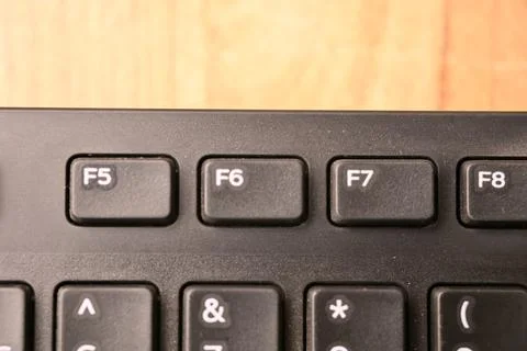 Black Computer Keyboard Macro Shot Highlighting F6 Key with Soft Blurred Ba.. Stock-Fotos