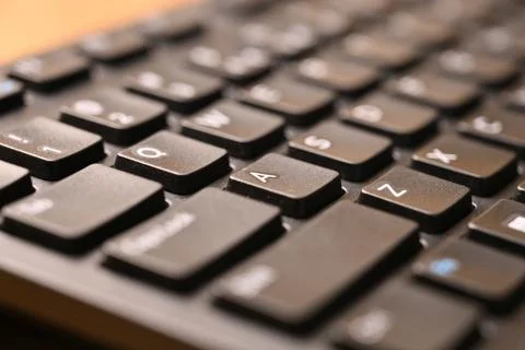 Black Computer Keyboard Macro Shot Highlighting A Key with Soft Blurred Bac.. Stock-Fotos