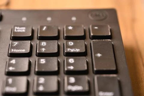 Black Computer Keyboard Macro Shot Highlighting 9 and Page Up Keys on Numer.. Stock Photos