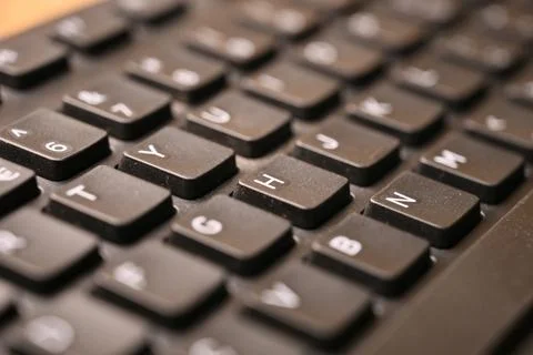 Black Computer Keyboard Macro Shot Highlighting H Key with Soft Blurred Bac.. 스톡 사진