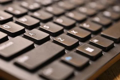 Black Computer Keyboard Macro Shot Highlighting Z Key with Soft Blurred Bac.. Stock-Fotos