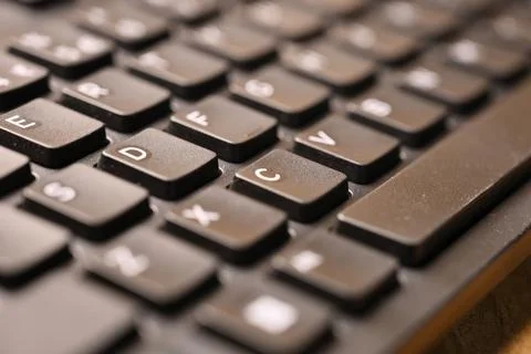 Black Computer Keyboard Macro Shot Highlighting C Key with Soft Blurred Bac.. Stock Photos