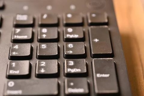 Black Computer Keyboard Macro Shot Highlighting Numeric Keypad Keys with An.. Foto stock