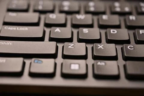 Black Computer Keyboard Macro Shot Highlighting Z Key with Soft Blurred Bac.. 스톡 사진
