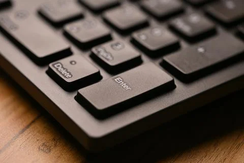 Black Computer Keyboard Macro Shot Highlighting Left Side Enter Key with So.. Stock Photos