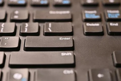 Black Computer Keyboard Macro Shot Highlighting Enter Key Button with Angle.. Stock Photos