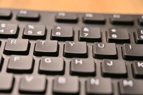 Black Computer Keyboard Macro Shot Highlighting Y Key with Angled Top View .. Stock Photos