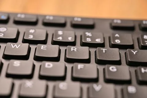 Black Computer Keyboard Macro Shot Highlighting R Key with Angled Top View .. Stock Photos