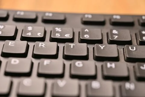 Black Computer Keyboard Macro Shot Highlighting T Key with Angled Top View .. Foto stock