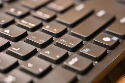 Black Computer Keyboard Macro Shot Highlighting Question Mark and Slash Key.. 写真素材