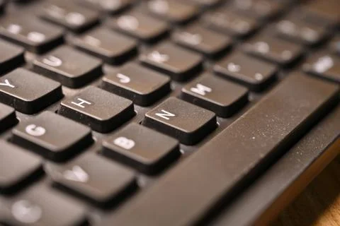Black Computer Keyboard Macro Shot Highlighting N Key with Soft Blurred Bac.. Stock Photos