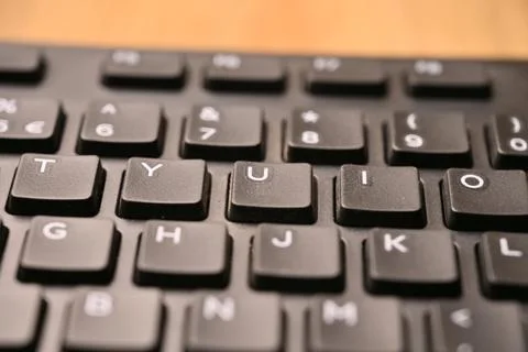 Black Computer Keyboard Macro Shot Highlighting U Key with Angled Top View .. Stock Photos