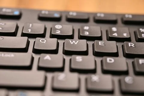 Black Computer Keyboard Macro Shot Highlighting W Key with Angled Top View .. 스톡 사진