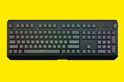 Black computer keyboard with rgb colors isolated on yellow background. Stock-Illustration