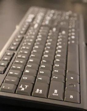 A black computer keyboard with selective focus Stock Photos