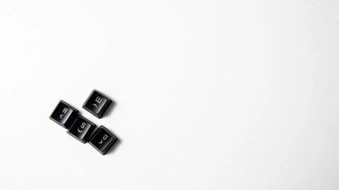 Black computer keys on a white background with w,a,d and s letters. Gaming keys. Stock Photos