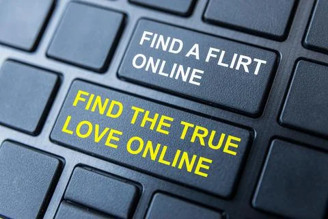 Black computer keys with words "find a flirt online" and "find the true love onl Stock Photos