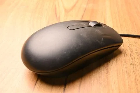 Black Computer Mouse, Angled Top View Close-Up Macro Photograph with Soft D.. Stock Photos