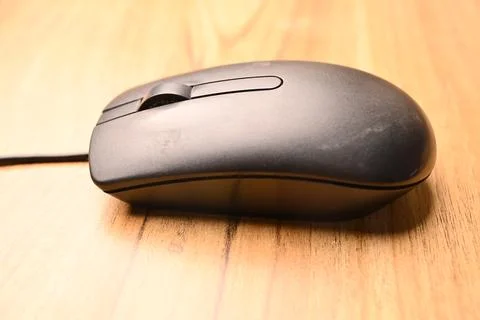 Black Computer Mouse, Angled Top View Close-Up Macro Photograph with Soft D.. 스톡 사진