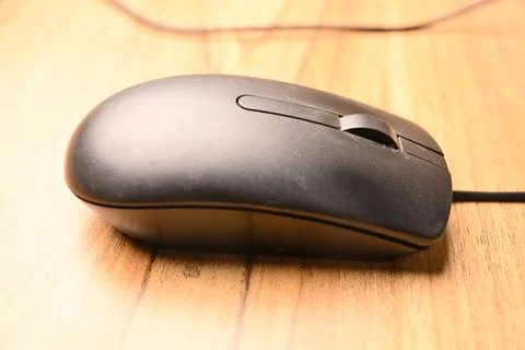 Black Computer Mouse, Angled Top View Close-Up Macro Photograph with Soft D.. Stock Photos