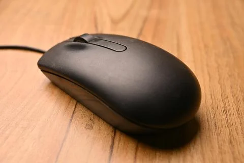 Black Computer Mouse, Angled Top View Close-Up Macro Photograph with Soft D.. Fotos Stock