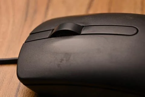 Black Computer Mouse, Angled Top View Close-Up Macro Photograph with Soft D.. Stock Photos