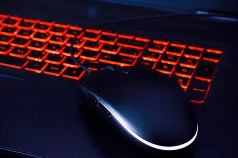Black Computer Mouse for computer Games with light Stock Photos