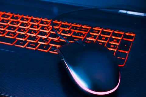 Black Computer Mouse for computer Games with light Stock Photos
