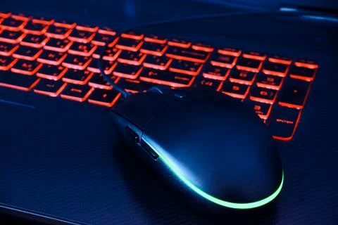 Black Computer Mouse for computer Games with light Stock Photos
