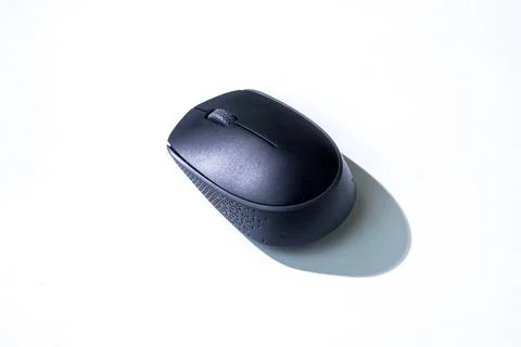A black computer mouse isolated on a clean white background, perfect for te.. Stock Photos