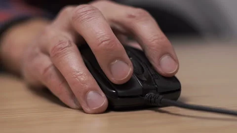 Black computer mouse on a work desk Stock Footage 144250695