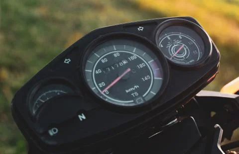 Black control panel and standard motorcycle speedometer Stock Photos