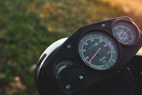 Black control panel and standard motorcycle speedometer Stock Photos