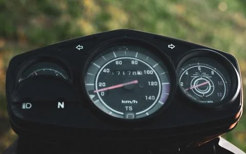 Black control panel and standard motorcycle speedometer Stock Photos