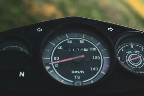 Black control panel and standard motorcycle speedometer Stock Photos