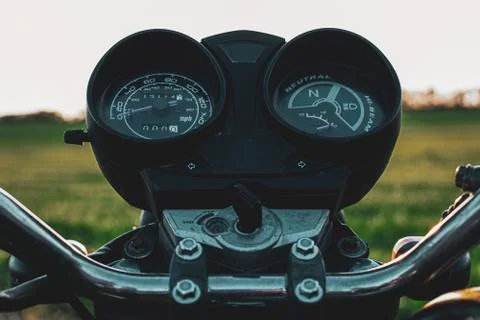 Black control panel and standard motorcycle speedometer Stock Photos