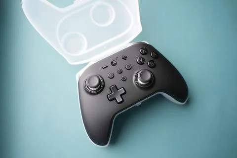 A black controller on a plastic box Stock Photos