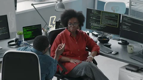 Black Couple of Programmers Talking in Office Stock Footage 276203623