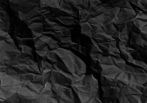 Black crumpled paper sheet texture background Stock Photos