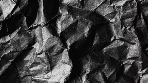 Black crumpled paper texture background, animated background Video stock 333977545