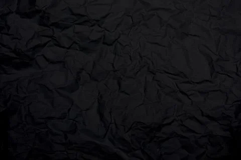 Black crumpled paper texture background. Black wrinkled paper texture backg.. Stock Photos