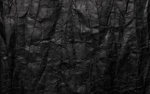Black crumpled paper texture, grunge background Stock Photos
