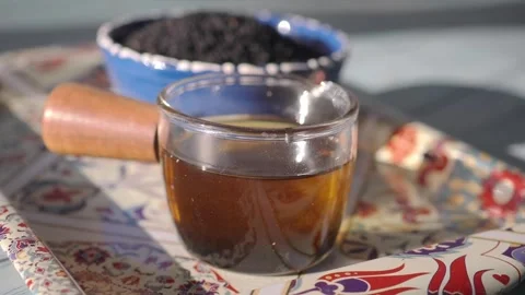 Black cumin seed oil in a small jar Stock-Footage 345015269