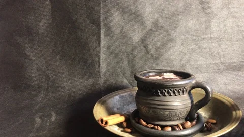 Black cup of aromatic coffee on a dark background Stock-Footage 119275862