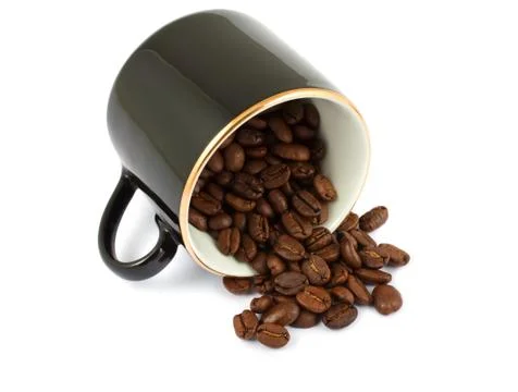 Black cup with coffee beans Stock Photos