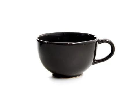 Black cup in white background Stock Photos